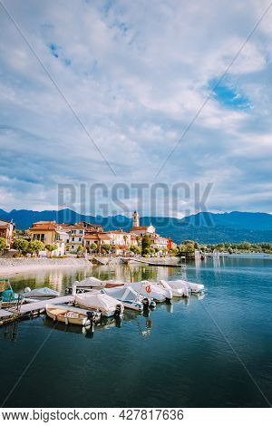 Feriolo, Verbania / Italy - June 2021: Feriolo Village On Lake Maggiore With Cloudy Sky With Small B