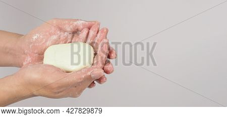 Hands Washing Gesture With Bar Soap And Bubble On White Background.