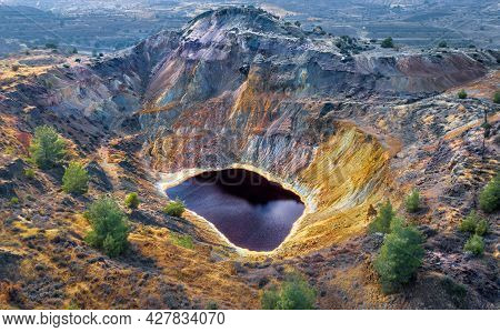 Acid Red Lake And Colorful Rocks In Abandoned Mine Pit Near Kampia, Cyprus. This Area Has Large Amou