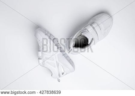 Useful Sports Habits And Orthopedic Shoes For Children Shoeing Isolated On A White Background