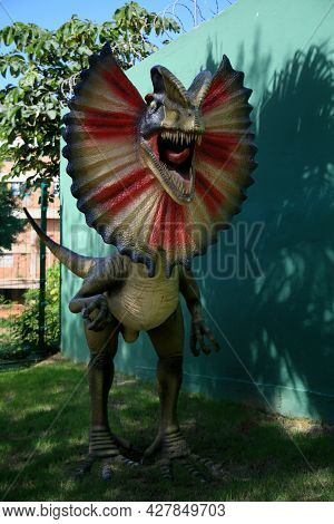 Dinosaur Sculpture In Park