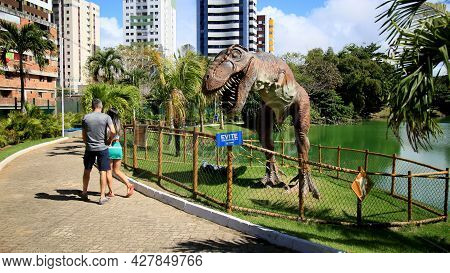 Dinosaur Sculpture In Park