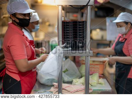 Bangkok Thailand: Jun 04 2021: Chef And Assistant Prepare Material Food For Cooking And Serve In The