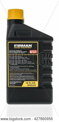 Winneconne, Wi -20 July 2021:  A Package Of Firman Power Equimpent Motor Oil Engine On An Isolated B
