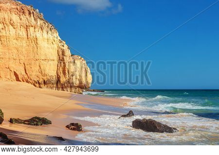 The famous beach of Praia dos Caneiros. Algarve.Portugal
