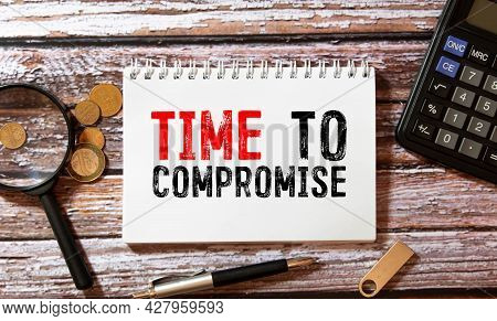 Businesman Hold Notepad With Text Time To Compromise. White Background. Business