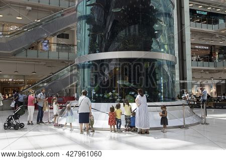 Moscow, Russia - July 2021, Tallest cylindrical aquarium in the world in shopping center Aviapark is