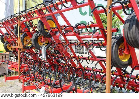 Kyiv, Ukraine - June 16, 2020: Large Disc Plough Unlu, Towing For Tractors To Plow Fields, Against T