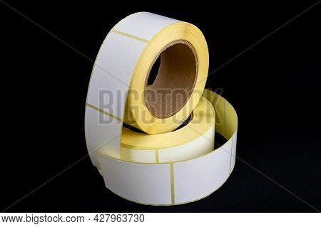 Blank Label Stickers. White Roll Of Labels For Thermal Perforation. Sticky Label Roll.