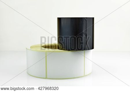 White Roll Of Labels For Thermal Perforation And Ribbon, Thermal Transfer Dye Tape. Stickers For The