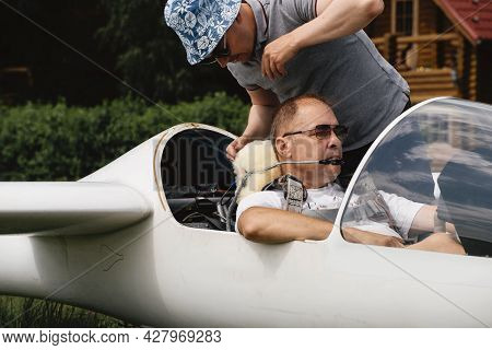 Soaring Club, Getting Ready For The Flight On Glider Airplane. Small Aviation Sport. Two Man Checkin