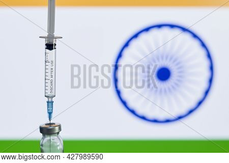 Wide Spread Of Indian Strain Of Covid-19 Virus. Delta Variant Of New Coronavirus. Vaccine Ampule And