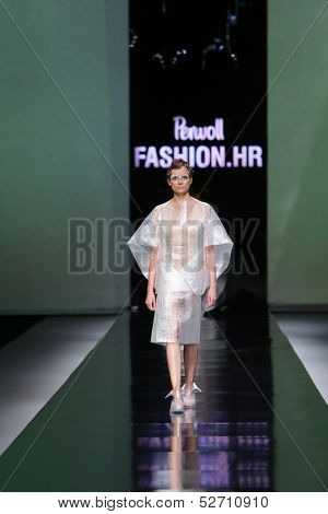 ZAGREB, CROATIA - OCTOBER 19: Fashion model wearing clothes designed by Branka Donassy on the 'Fashion.hr' show on October 19, 2013 in Zagreb, Croatia.