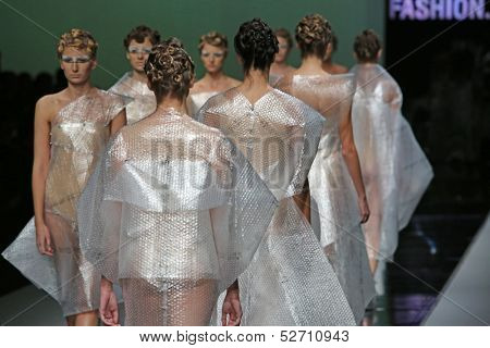 ZAGREB, CROATIA - OCTOBER 19: Fashion models wearing clothes designed by Branka Donassy on the 'Fashion.hr' show on October 19, 2013 in Zagreb, Croatia.
