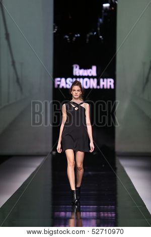 ZAGREB, CROATIA - OCTOBER 19: Fashion model wearing clothes designed by Pavla Aleksic on the 'Fashion.hr' show on October 19, 2013 in Zagreb, Croatia.