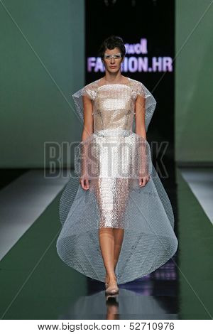 ZAGREB, CROATIA - OCTOBER 19: Fashion model wearing clothes designed by Branka Donassy on the 'Fashion.hr' show on October 19, 2013 in Zagreb, Croatia.