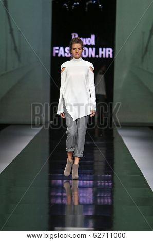 ZAGREB, CROATIA - OCTOBER 19: Fashion model wearing clothes designed by Pavla Aleksic on the 'Fashion.hr' show on October 19, 2013 in Zagreb, Croatia.