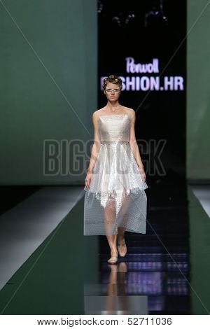 ZAGREB, CROATIA - OCTOBER 19: Fashion model wearing clothes designed by Branka Donassy on the 'Fashion.hr' show on October 19, 2013 in Zagreb, Croatia.