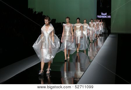 ZAGREB, CROATIA - OCTOBER 19: Fashion models wearing clothes designed by Branka Donassy on the 'Fashion.hr' show on October 19, 2013 in Zagreb, Croatia.