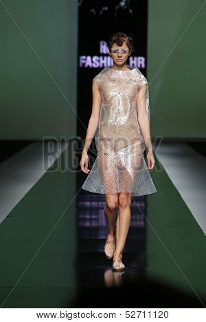 ZAGREB, CROATIA - OCTOBER 19: Fashion model wearing clothes designed by Branka Donassy on the 'Fashion.hr' show on October 19, 2013 in Zagreb, Croatia.