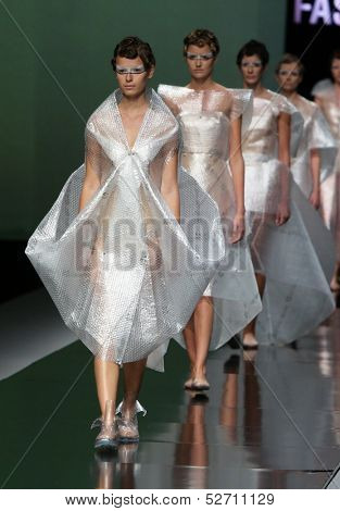 ZAGREB, CROATIA - OCTOBER 19: Fashion models wearing clothes designed by Branka Donassy on the 'Fashion.hr' show on October 19, 2013 in Zagreb, Croatia.
