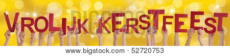 Hands Holding Vrolijk Kerstfeest On Golden Background