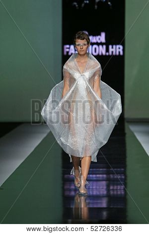 ZAGREB, CROATIA - OCTOBER 19: Fashion model wearing clothes designed by Branka Donassy on the 'Fashion.hr' show on October 19, 2013 in Zagreb, Croatia.