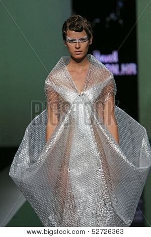 ZAGREB, CROATIA - OCTOBER 19: Fashion model wearing clothes designed by Branka Donassy on the 'Fashion.hr' show on October 19, 2013 in Zagreb, Croatia.