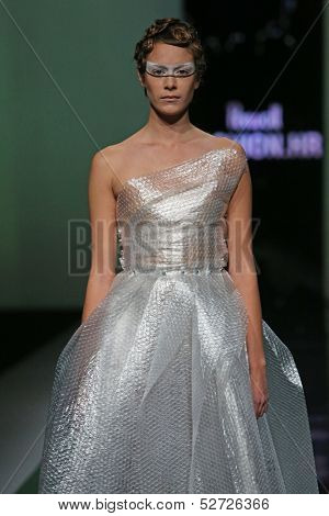 ZAGREB, CROATIA - OCTOBER 19: Fashion model wearing clothes designed by Branka Donassy on the 'Fashion.hr' show on October 19, 2013 in Zagreb, Croatia.