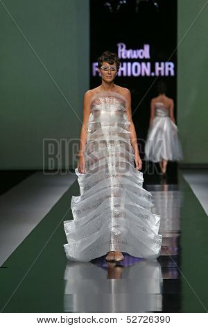 ZAGREB, CROATIA - OCTOBER 19: Fashion model wearing clothes designed by Branka Donassy on the 'Fashion.hr' show on October 19, 2013 in Zagreb, Croatia.