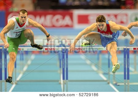 GOTHENBURG, SWEDEN - MARCH 1 Balazs Baji (Hungary) wins heat 2 of the qualification of the men's 60m hurdles event during the Athletics Indoor Championship on March 1, 2013 in Gothenburg, Sweden.