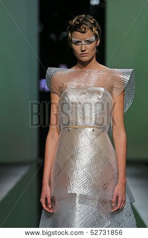 ZAGREB, CROATIA - OCTOBER 19: Fashion model wearing clothes designed by Branka Donassy on the 'Fashion.hr' show on October 19, 2013 in Zagreb, Croatia.