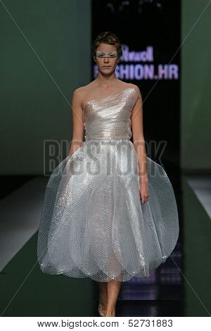 ZAGREB, CROATIA - OCTOBER 19: Fashion model wearing clothes designed by Branka Donassy on the 'Fashion.hr' show on October 19, 2013 in Zagreb, Croatia.