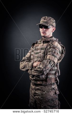 Military Man On A Black Background