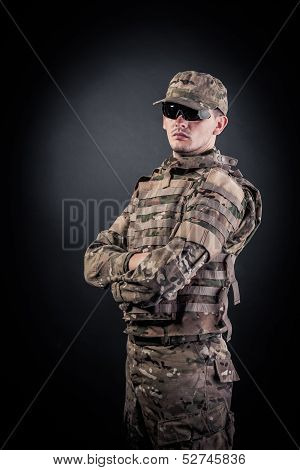 Military Man On A Black Background