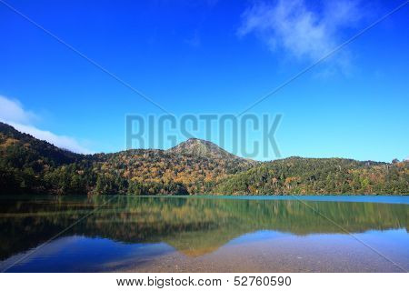 Mountain And Pond In Autumn