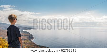 Boy  Looking Down From The Top