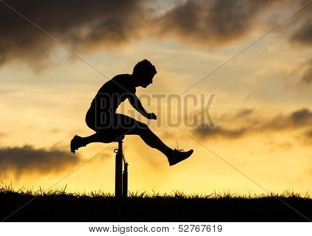 silhouette of hurdling