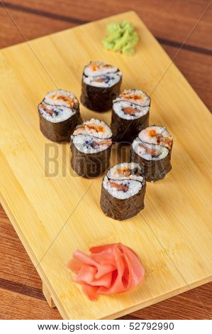 Japanese cuisine - sushi rolls with tobico and pancake