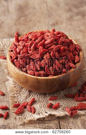 Goji berries in a wooden bowl