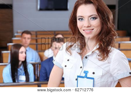Businesswoman delivering presentation at conference