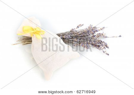 Textile sachet pouch with dried lavender flowers isolated on white