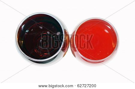 Two Glasses With Drinks On A White Background