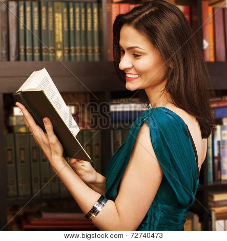 stock photo portrait of beauty young woman reading book in library