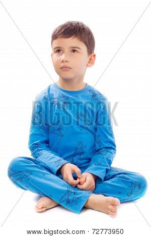 Boy In Pajamas On White Background