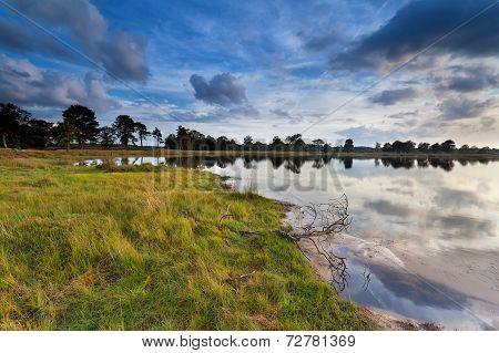 Blue Cloudscape Reflected In Lake
