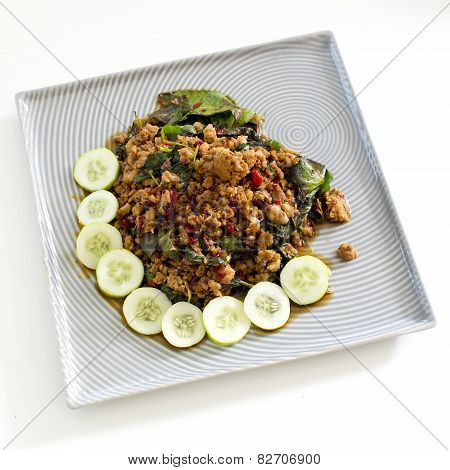 Thai Spicy Food Basil Meat Fried Recipe (krapao Mooi) On Square Plate Isolate On White Background
