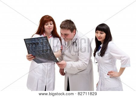 Image of curious interns looking at x-ray