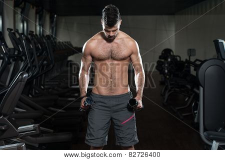 Male Athlete Doing Heavy Weight Exercise For Biceps