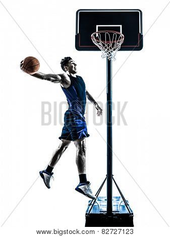 one  man basketball player jumping dunking in silhouette isolated white background